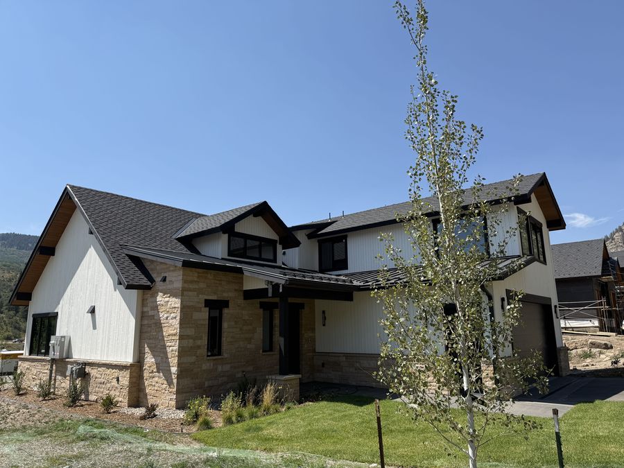 New construction home with newly installed sod lawn in Minturn, Colorado